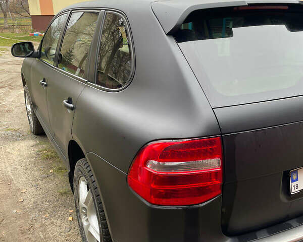 Черный Порше Каен, объемом двигателя 3.6 л и пробегом 245 тыс. км за 13500 $, фото 2 на Automoto.ua