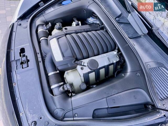 Черный Порше Каен, объемом двигателя 4.81 л и пробегом 181 тыс. км за 10900 $, фото 84 на Automoto.ua