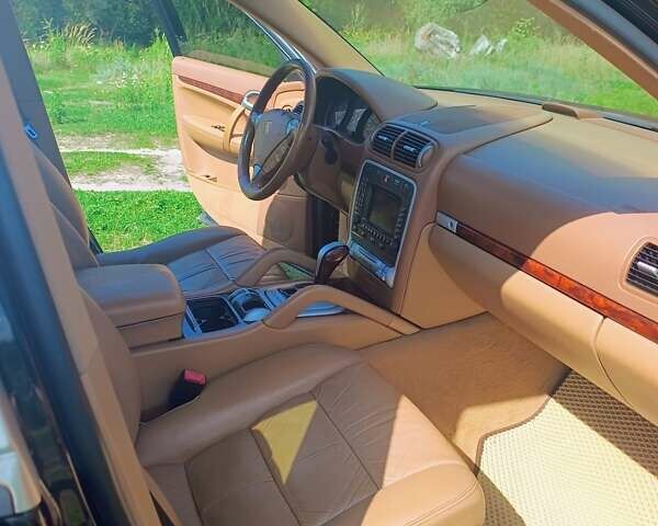 Черный Порше Каен, объемом двигателя 3.6 л и пробегом 220 тыс. км за 11300 $, фото 15 на Automoto.ua