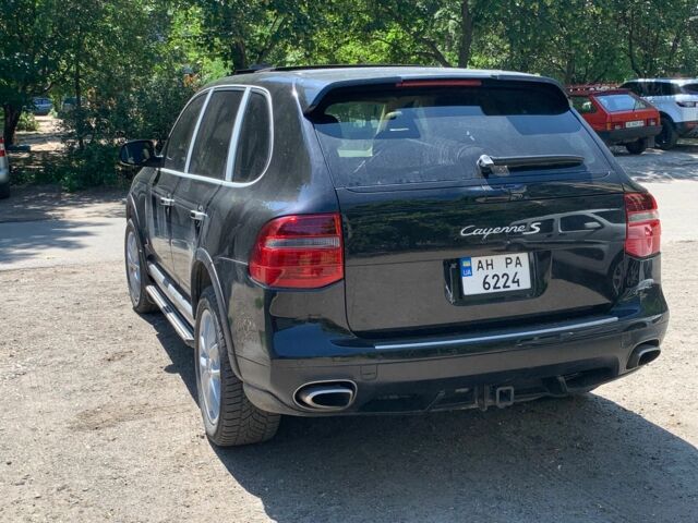 Черный Порше Каен, объемом двигателя 4.8 л и пробегом 150 тыс. км за 12500 $, фото 1 на Automoto.ua