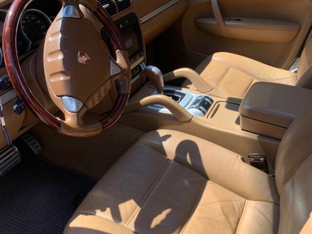 Черный Порше Каен, объемом двигателя 4.8 л и пробегом 150 тыс. км за 12500 $, фото 2 на Automoto.ua