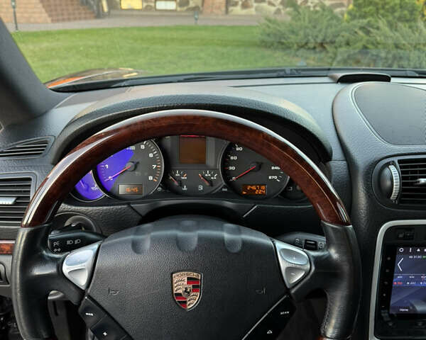 Чорний Порше Cayenne, об'ємом двигуна 3.6 л та пробігом 246 тис. км за 12000 $, фото 14 на Automoto.ua