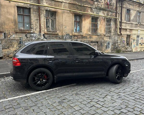 Черный Порше Каен, объемом двигателя 4.8 л и пробегом 140 тыс. км за 8500 $, фото 1 на Automoto.ua