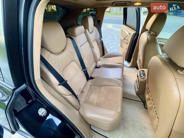 Черный Порше Каен, объемом двигателя 4.81 л и пробегом 181 тыс. км за 10900 $, фото 74 на Automoto.ua