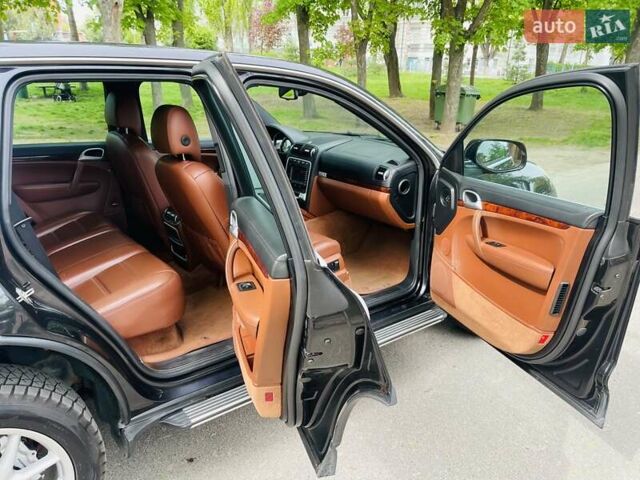 Черный Порше Каен, объемом двигателя 4.8 л и пробегом 94 тыс. км за 11800 $, фото 9 на Automoto.ua