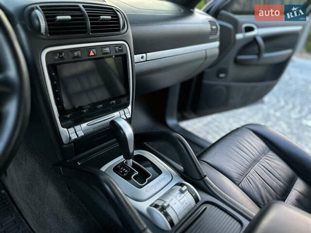 Черный Порше Каен, объемом двигателя 4.8 л и пробегом 145 тыс. км за 15700 $, фото 1 на Automoto.ua