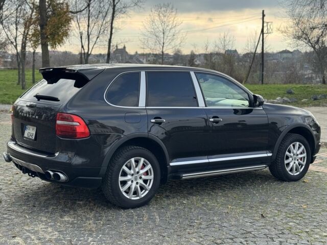 Черный Порше Каен, объемом двигателя 4.8 л и пробегом 170 тыс. км за 9000 $, фото 2 на Automoto.ua