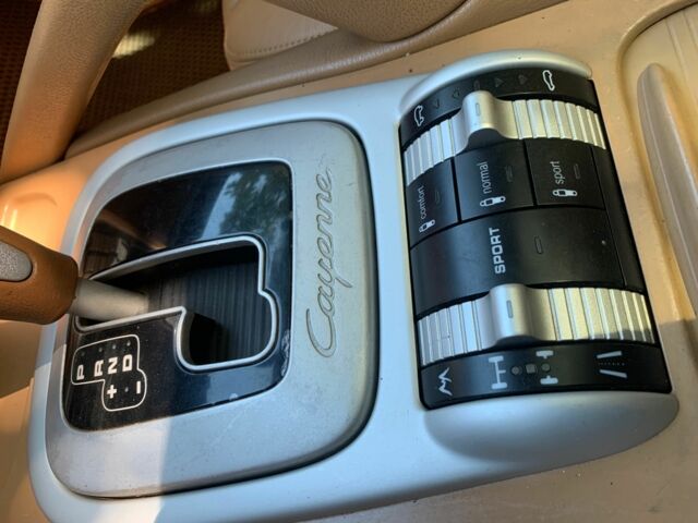 Черный Порше Каен, объемом двигателя 4.8 л и пробегом 150 тыс. км за 12500 $, фото 3 на Automoto.ua