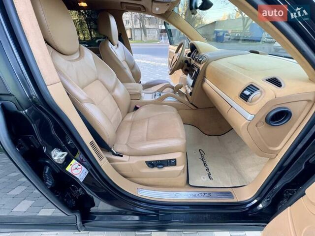 Черный Порше Каен, объемом двигателя 4.81 л и пробегом 181 тыс. км за 10900 $, фото 57 на Automoto.ua