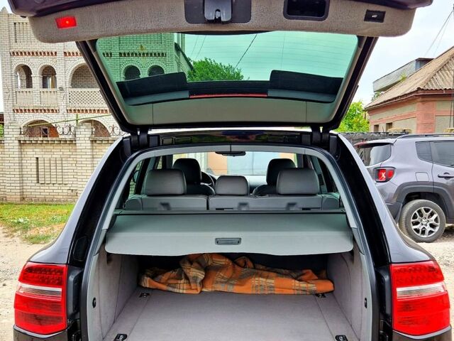 Черный Порше Каен, объемом двигателя 3.6 л и пробегом 210 тыс. км за 9700 $, фото 5 на Automoto.ua