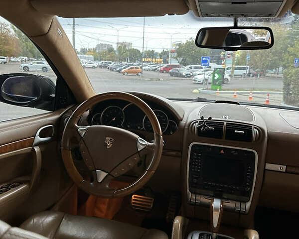 Черный Порше Каен, объемом двигателя 4.8 л и пробегом 147 тыс. км за 9500 $, фото 5 на Automoto.ua
