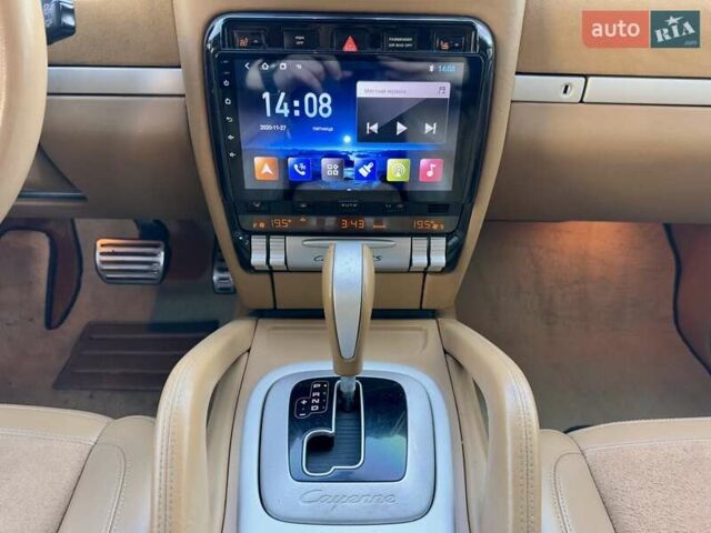 Черный Порше Каен, объемом двигателя 4.81 л и пробегом 181 тыс. км за 10900 $, фото 79 на Automoto.ua