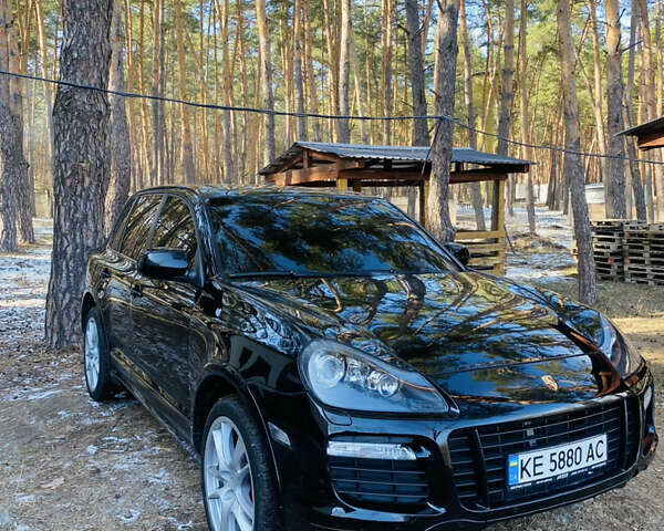 Черный Порше Каен, объемом двигателя 4.81 л и пробегом 90 тыс. км за 11500 $, фото 1 на Automoto.ua