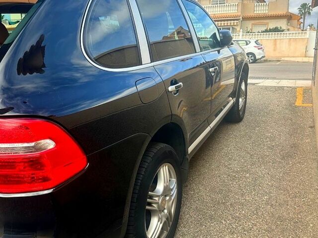 Черный Порше Каен, объемом двигателя 3.6 л и пробегом 175 тыс. км за 9000 $, фото 7 на Automoto.ua