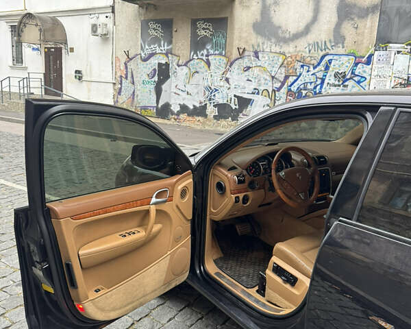 Черный Порше Каен, объемом двигателя 4.8 л и пробегом 140 тыс. км за 8500 $, фото 8 на Automoto.ua