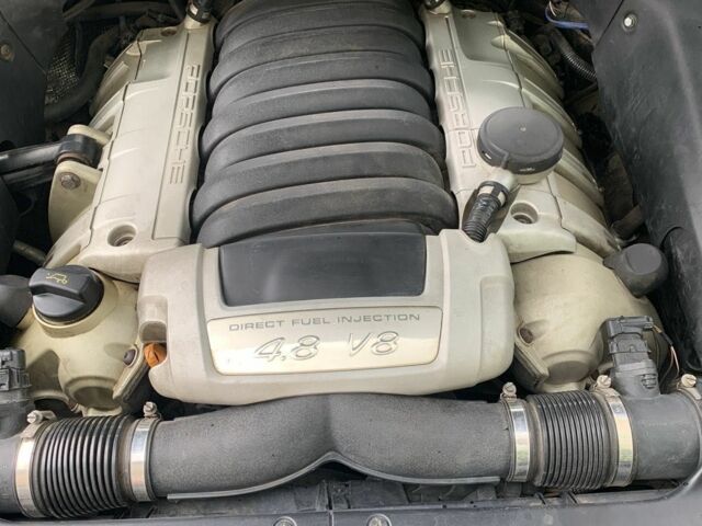 Черный Порше Каен, объемом двигателя 4.8 л и пробегом 150 тыс. км за 12500 $, фото 4 на Automoto.ua