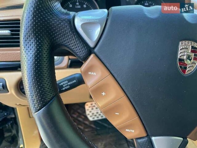 Черный Порше Каен, объемом двигателя 3.6 л и пробегом 247 тыс. км за 15990 $, фото 24 на Automoto.ua