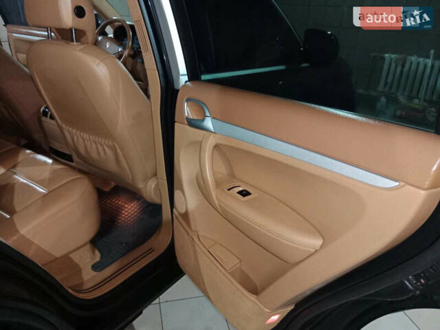 Черный Порше Каен, объемом двигателя 3.6 л и пробегом 155 тыс. км за 12500 $, фото 16 на Automoto.ua