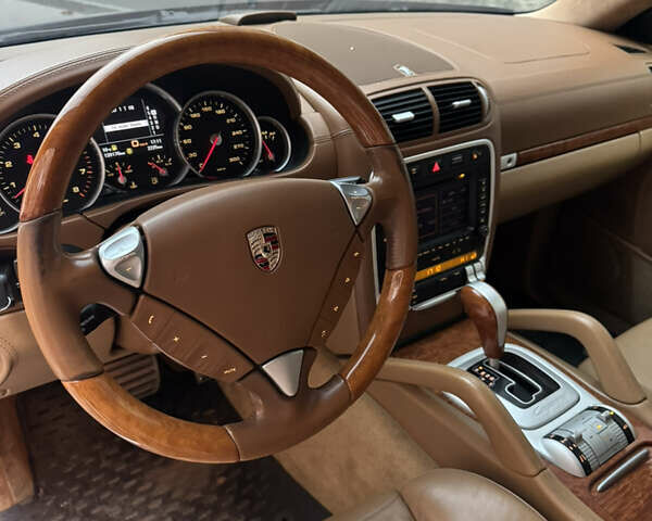 Черный Порше Каен, объемом двигателя 4.81 л и пробегом 140 тыс. км за 8000 $, фото 11 на Automoto.ua