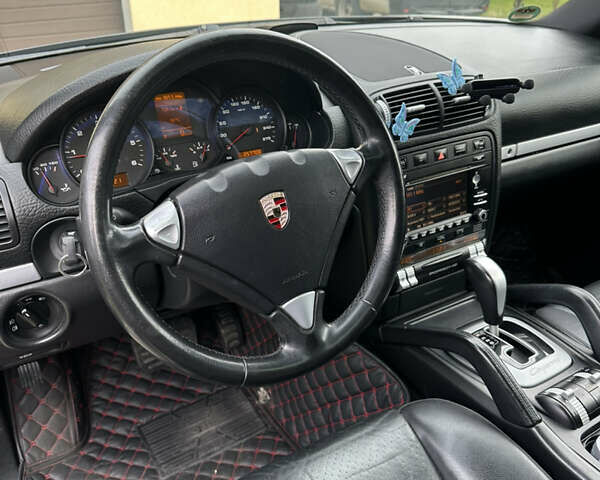 Черный Порше Каен, объемом двигателя 2.97 л и пробегом 261 тыс. км за 18200 $, фото 12 на Automoto.ua