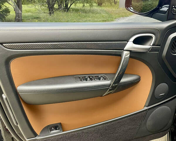 Черный Порше Каен, объемом двигателя 4.81 л и пробегом 120 тыс. км за 18500 $, фото 13 на Automoto.ua