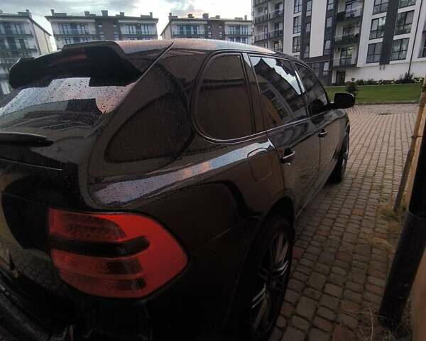 Черный Порше Каен, объемом двигателя 2.97 л и пробегом 250 тыс. км за 14000 $, фото 6 на Automoto.ua