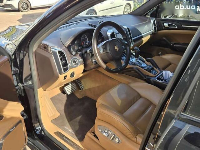 Черный Порше Каен, объемом двигателя 4.8 л и пробегом 105 тыс. км за 25900 $, фото 6 на Automoto.ua