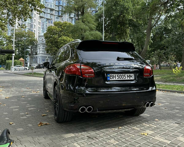 Чорний Порше Cayenne, об'ємом двигуна 4.8 л та пробігом 103 тис. км за 31000 $, фото 1 на Automoto.ua