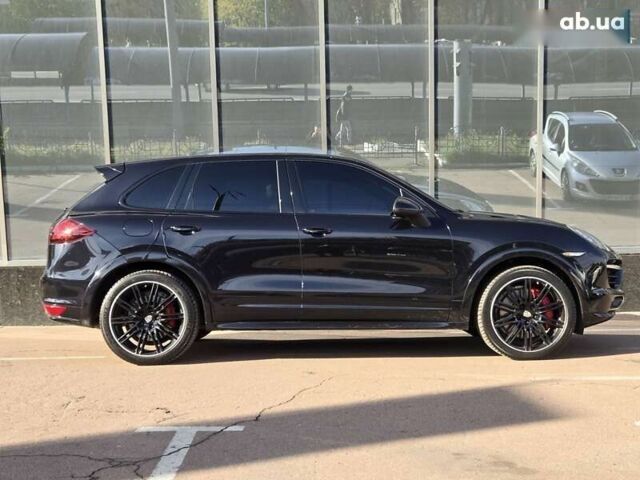 Черный Порше Каен, объемом двигателя 4.8 л и пробегом 105 тыс. км за 25900 $, фото 5 на Automoto.ua