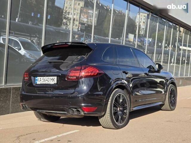 Черный Порше Каен, объемом двигателя 4.8 л и пробегом 105 тыс. км за 25900 $, фото 3 на Automoto.ua