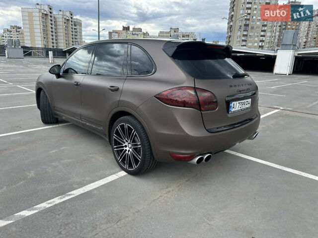 Черный Порше Каен, объемом двигателя 4.8 л и пробегом 150 тыс. км за 18000 $, фото 10 на Automoto.ua