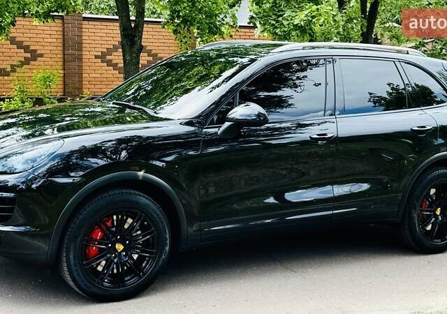 Черный Порше Каен, объемом двигателя 4.8 л и пробегом 163 тыс. км за 23900 $, фото 136 на Automoto.ua