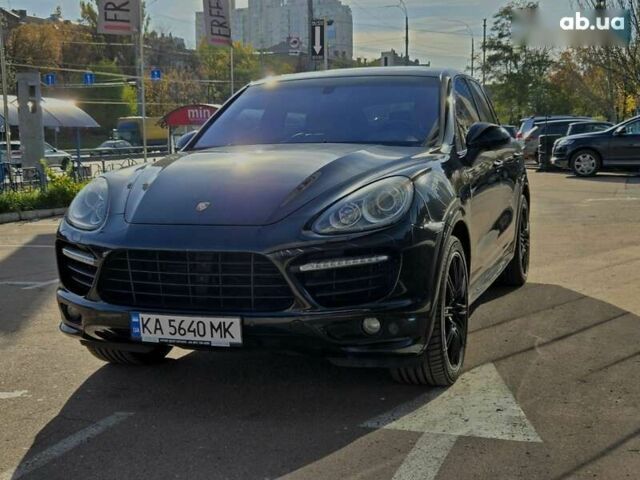 Черный Порше Каен, объемом двигателя 4.8 л и пробегом 105 тыс. км за 25900 $, фото 1 на Automoto.ua