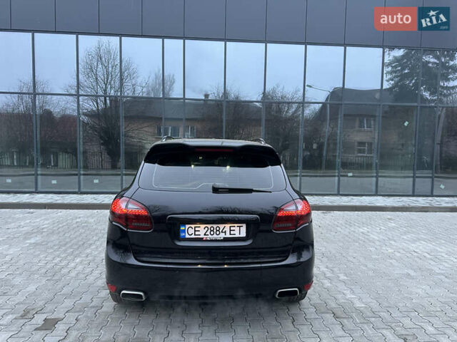 Черный Порше Каен, объемом двигателя 2.97 л и пробегом 302 тыс. км за 18000 $, фото 5 на Automoto.ua