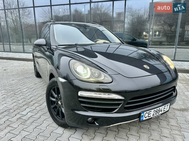 Черный Порше Каен, объемом двигателя 2.97 л и пробегом 302 тыс. км за 18000 $, фото 1 на Automoto.ua