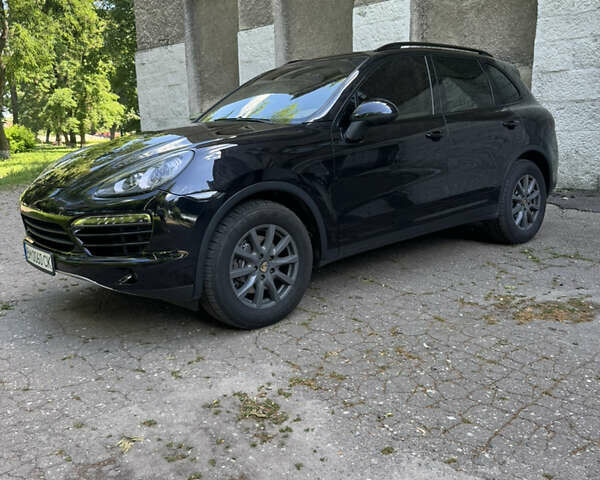 Черный Порше Каен, объемом двигателя 3 л и пробегом 249 тыс. км за 19900 $, фото 1 на Automoto.ua