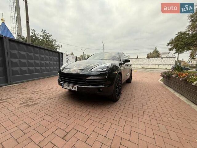 Черный Порше Каен, объемом двигателя 4.81 л и пробегом 200 тыс. км за 16500 $, фото 2 на Automoto.ua