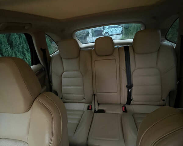 Черный Порше Каен, объемом двигателя 4.81 л и пробегом 136 тыс. км за 26000 $, фото 8 на Automoto.ua