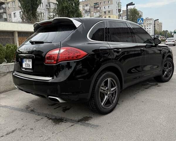 Черный Порше Каен, объемом двигателя 3.6 л и пробегом 151 тыс. км за 23500 $, фото 1 на Automoto.ua
