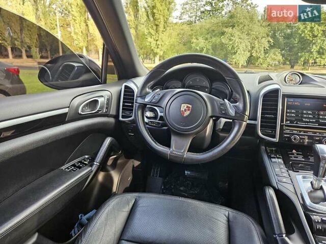 Черный Порше Каен, объемом двигателя 3 л и пробегом 258 тыс. км за 22850 $, фото 86 на Automoto.ua