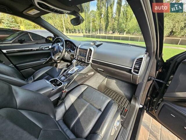 Черный Порше Каен, объемом двигателя 3 л и пробегом 258 тыс. км за 22850 $, фото 94 на Automoto.ua