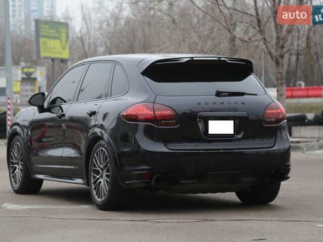 Черный Порше Каен, объемом двигателя 4.81 л и пробегом 152 тыс. км за 21900 $, фото 4 на Automoto.ua