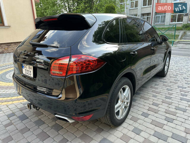 Черный Порше Каен, объемом двигателя 3 л и пробегом 177 тыс. км за 28900 $, фото 2 на Automoto.ua