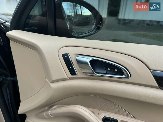 Черный Порше Каен, объемом двигателя 3.6 л и пробегом 274 тыс. км за 24950 $, фото 182 на Automoto.ua