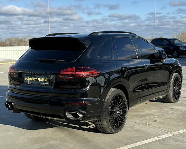 Черный Порше Каен, объемом двигателя 3 л и пробегом 170 тыс. км за 34999 $, фото 4 на Automoto.ua