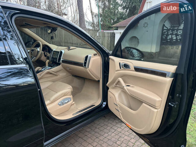 Черный Порше Каен, объемом двигателя 3.6 л и пробегом 274 тыс. км за 24950 $, фото 74 на Automoto.ua