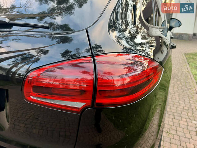 Черный Порше Каен, объемом двигателя 3.6 л и пробегом 274 тыс. км за 24950 $, фото 112 на Automoto.ua