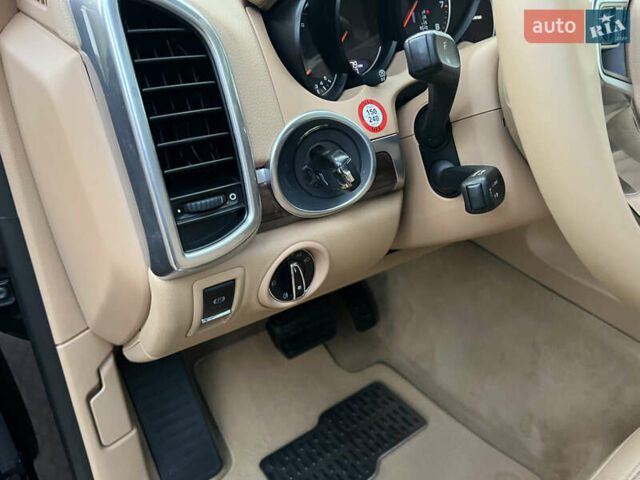 Черный Порше Каен, объемом двигателя 3.6 л и пробегом 274 тыс. км за 24950 $, фото 133 на Automoto.ua