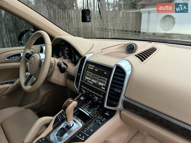 Черный Порше Каен, объемом двигателя 3.6 л и пробегом 274 тыс. км за 24950 $, фото 191 на Automoto.ua