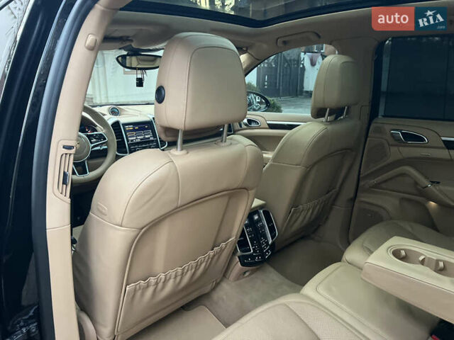 Черный Порше Каен, объемом двигателя 3.6 л и пробегом 274 тыс. км за 24950 $, фото 170 на Automoto.ua